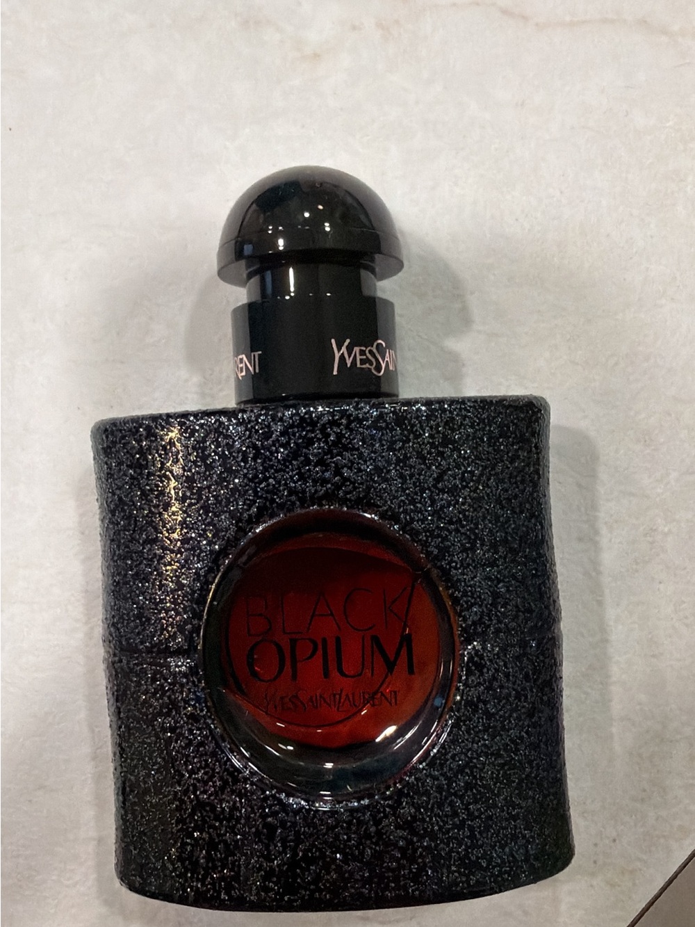 Fragrance bottle (Yves Saint Laurent Black Opium)